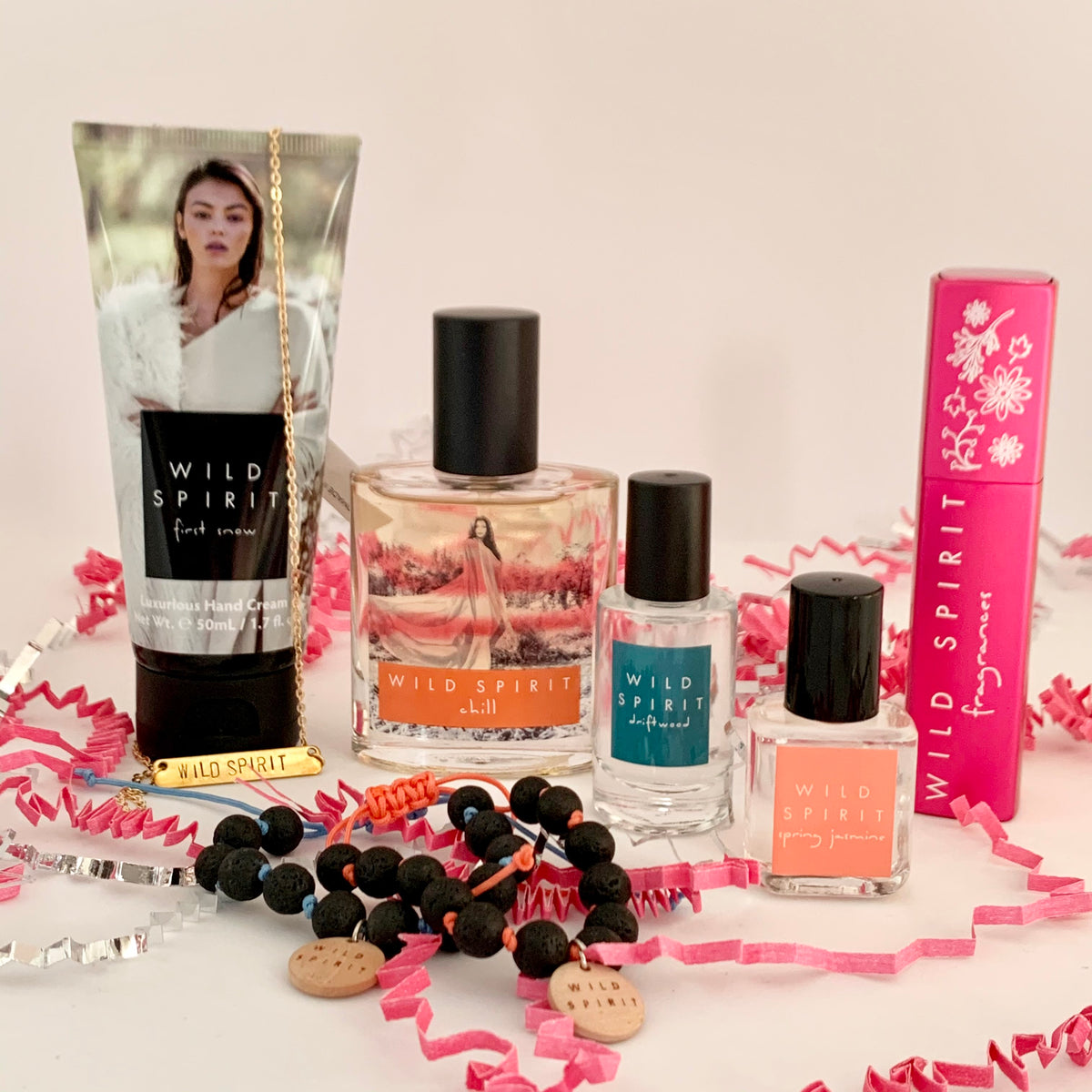 Whether a sweet, floral, fresh, or bold perfume lover, this kit has a little bit of everything and is full of mix and matching potential. Satisfy your sweet tooth with our best-selling Chill perfume, feel flirty on the go with a Rosy Glow Atomizer, keep hands moisturized with our First Snow Hand Cream, enjoy breezy florals with a Spring Jasmine Rollerball, stay fresh with a Driftwood Body Splash, and accessorize with our beautiful Wild Spirit Bar Necklace and two lava bead bracelets.